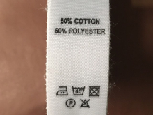 Этикетка состава (cotton 50% polyester 50%) 2,5см (100м) Этикетка состава (cotton 50% polyester 50%) 2,5см (100м)