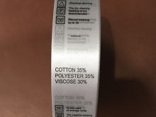 Этикетка состава атласная (cotton 35% polyester 35% viscose 30%) 2,5см (100м) Этикетка состава атласная (cotton 35% polyester 35% viscose 30%) 2,5см (100м)