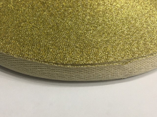 Тесьма ТЖ флаг 15мм (50м) бежевый золото люрекс Тесьма ТЖ флаг 15мм (50м) бежевый золото люрекс