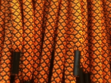 Шнурок круглый 6мм №32 1,25м ораньжевый с чёрным